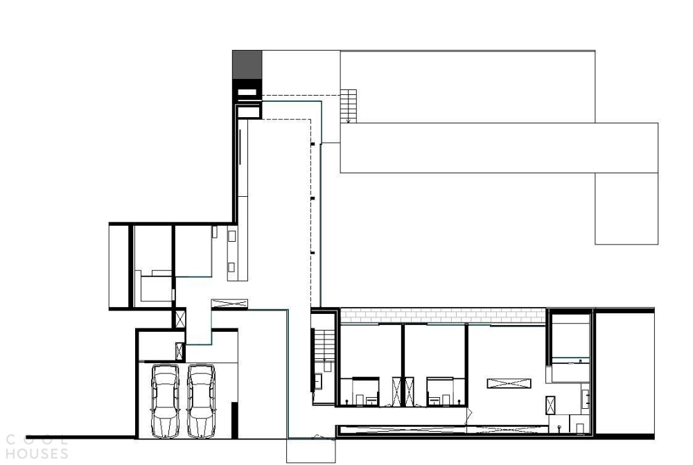 Бетонный дом с креативным дизайном, интегрированный в природный ландшафт